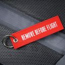 Remove Before Flight RBF prívesok kľúčenka