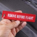 Remove Before Flight RBF prívesok kľúčenka